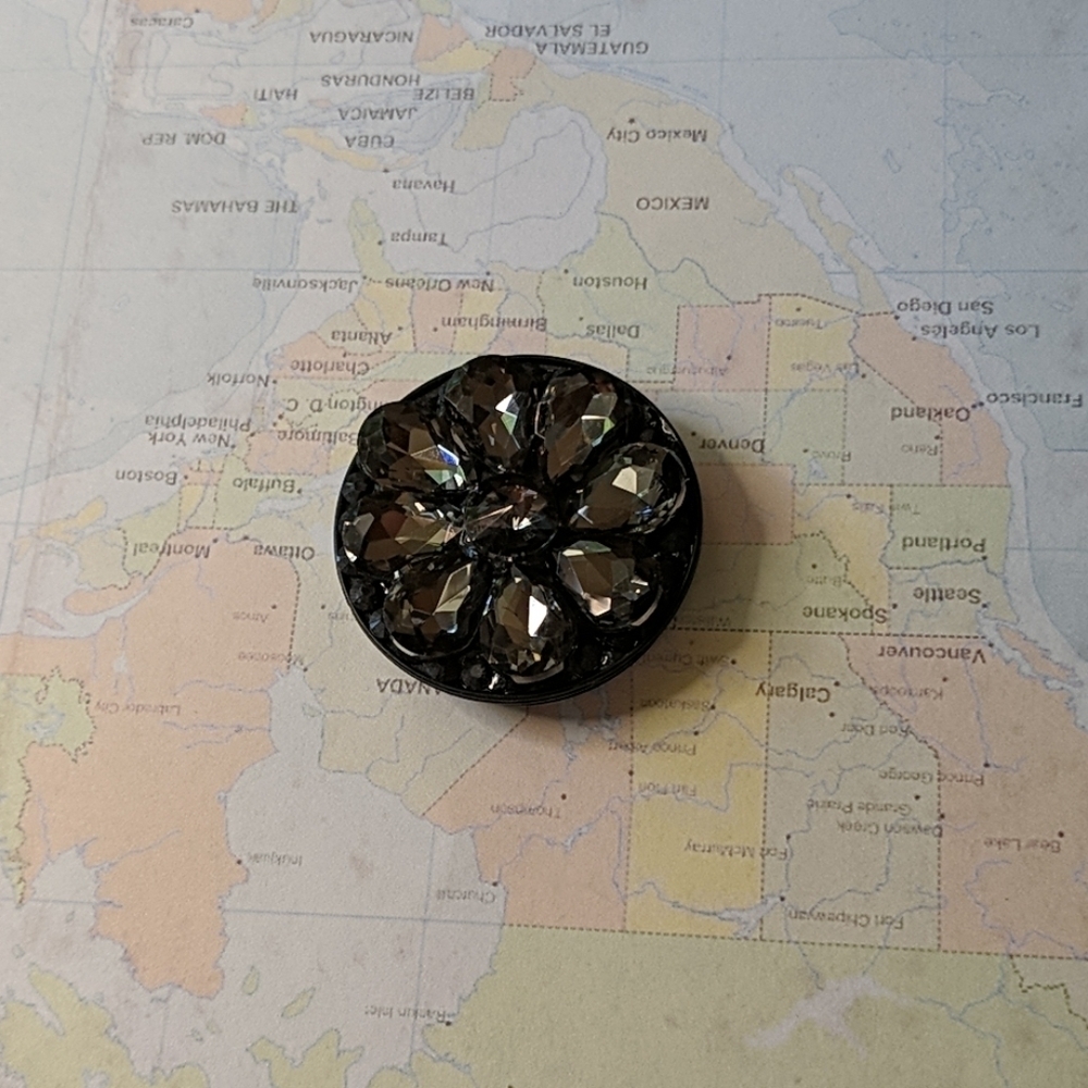 Black bejeweled phone holder